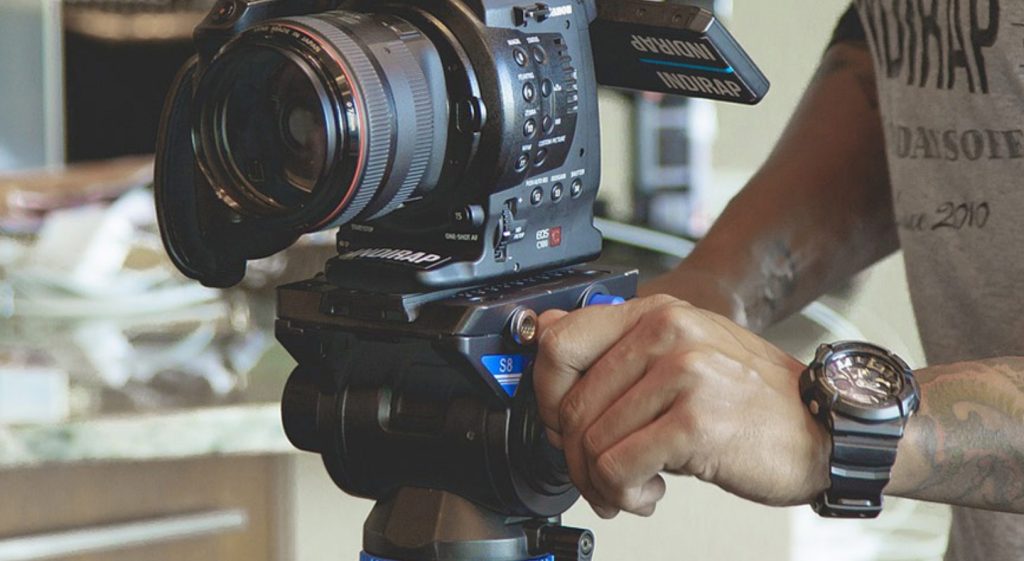 Person running a camera at Willinet, the local TV access station.